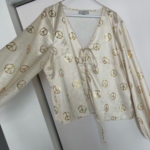 Never Fully Dressed | Gold Peace Frill Top